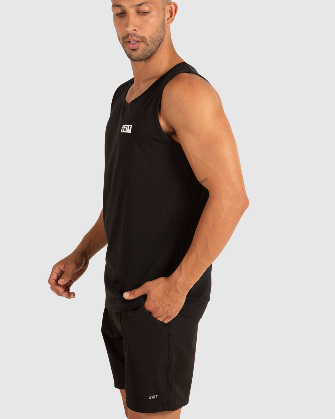 UNIT Case Mens Singlet